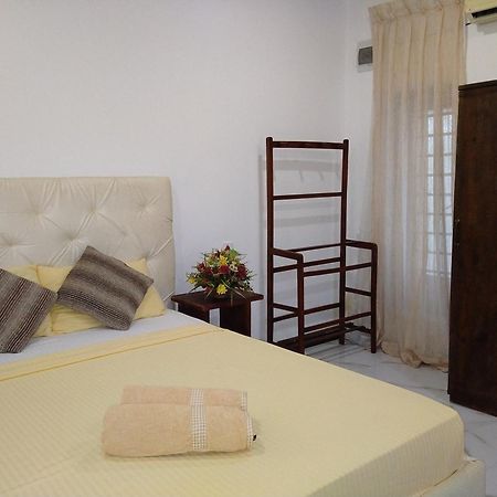Living Home Negombo Szoba fotó