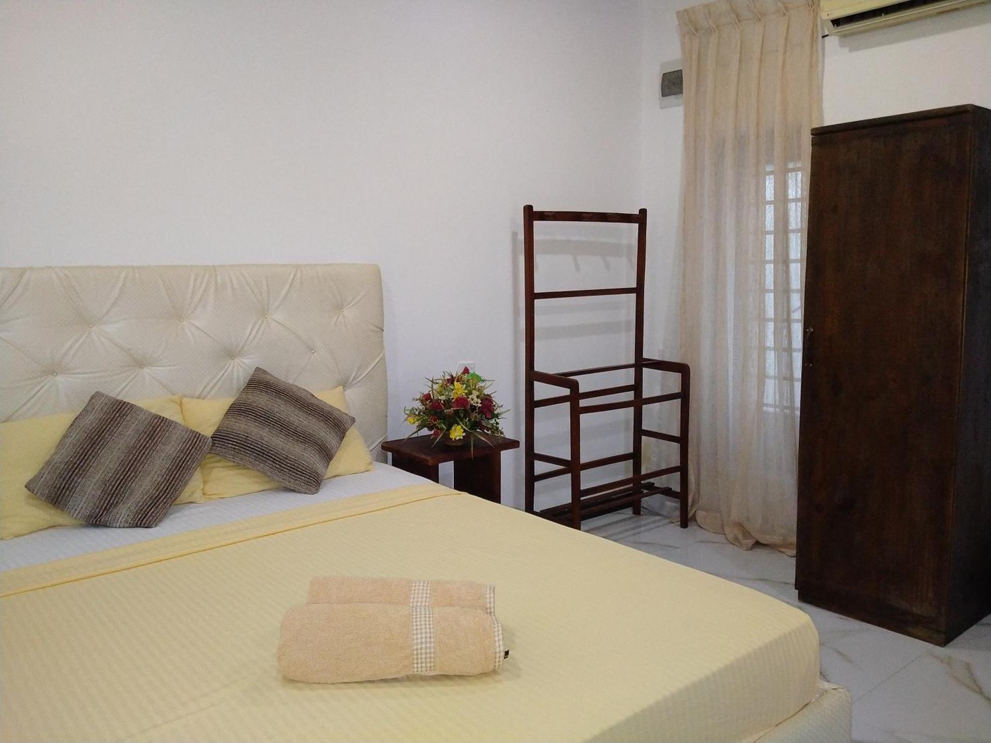 Living Home Negombo Szoba fotó